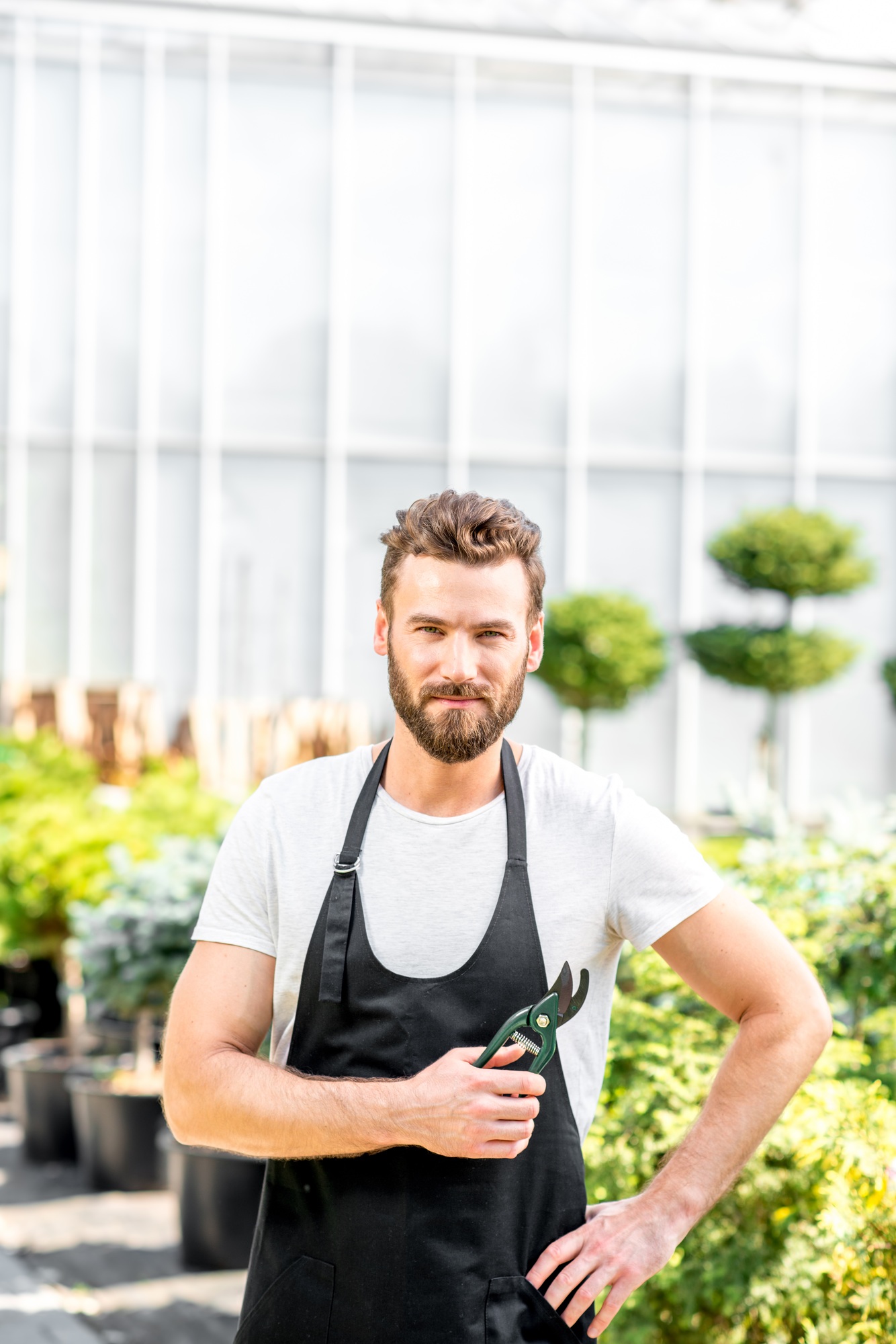 Portrait of a handsome gardener